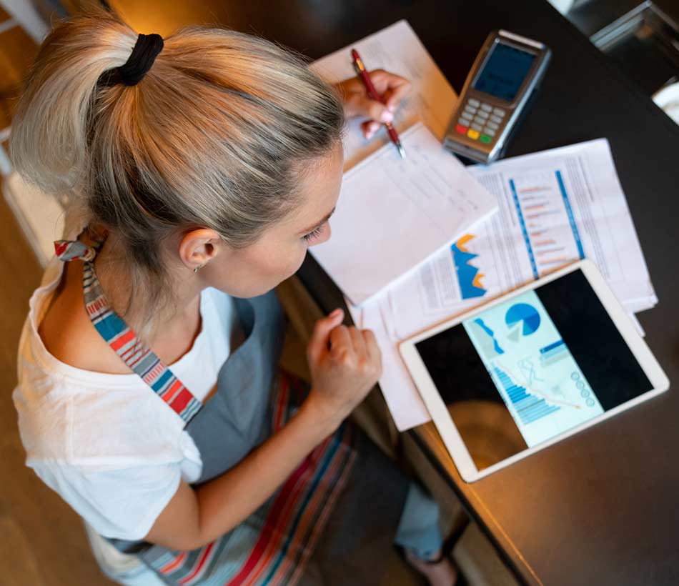 Business owner going through her financials.