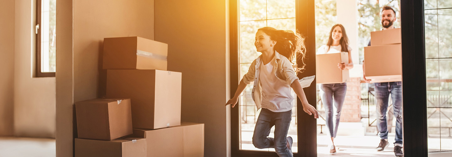 Family moving in to their new home.